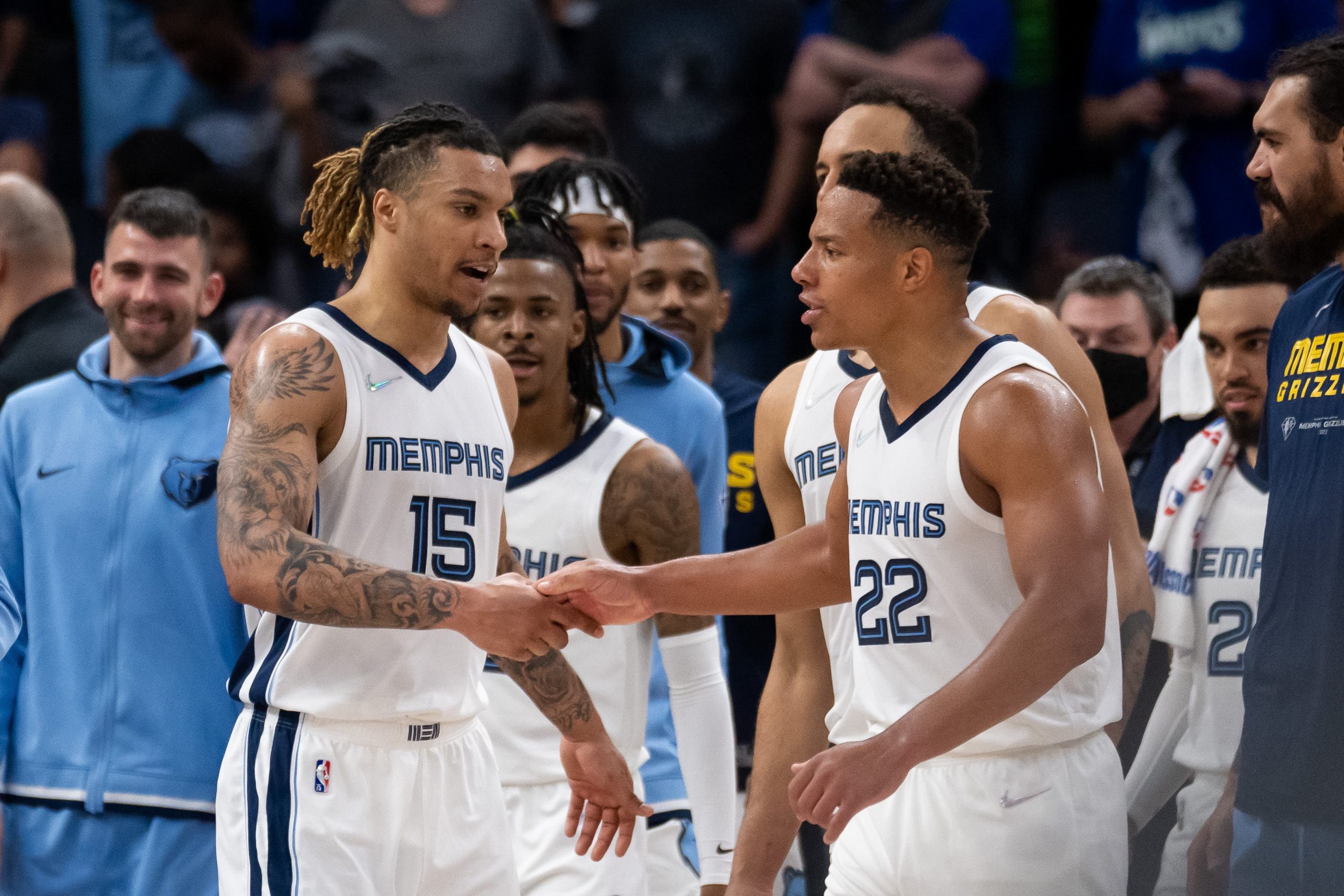Memphis Grizzlies forward Brandon Clarke (15) and guard Desmond Bane (22) celebrates after the game against the Minnesota Timberwolves during game one of the three round for the 2022 NBA playoffs at Target Center