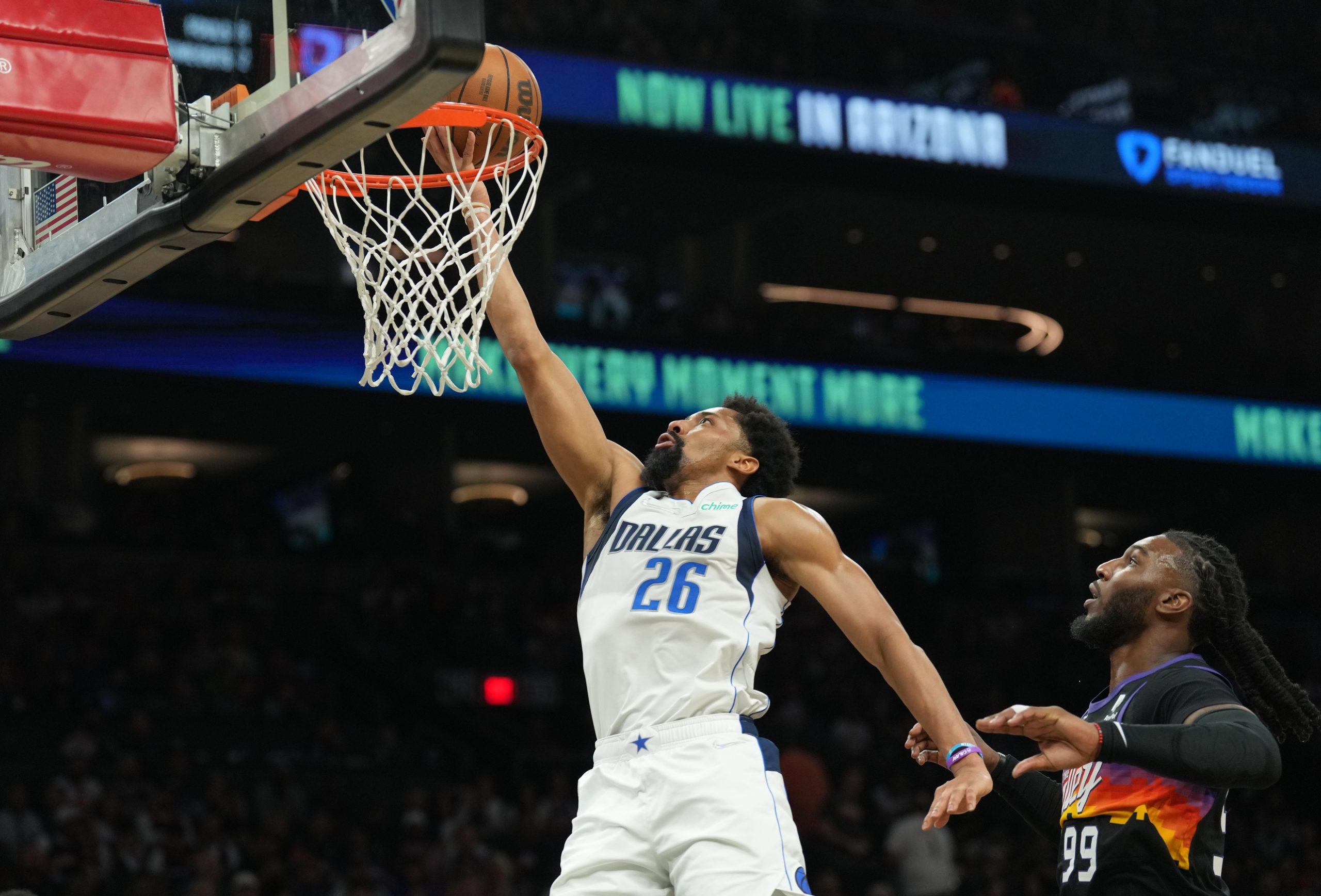 Dallas Mavericks guard Spencer Dinwiddie (26) goes up for a layup against Phoenix Suns forward Jae Crowder (99) during the second half of game one of the second round for the 2022 NBA playoffs against the Phoenix Suns.