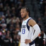 Dallas Mavericks guard Jalen Brunson (13) looks on during a break in fourth quarter action against the Utah Jazz during game six of the first round for the 2022 NBA playoffs at Vivint Arena.