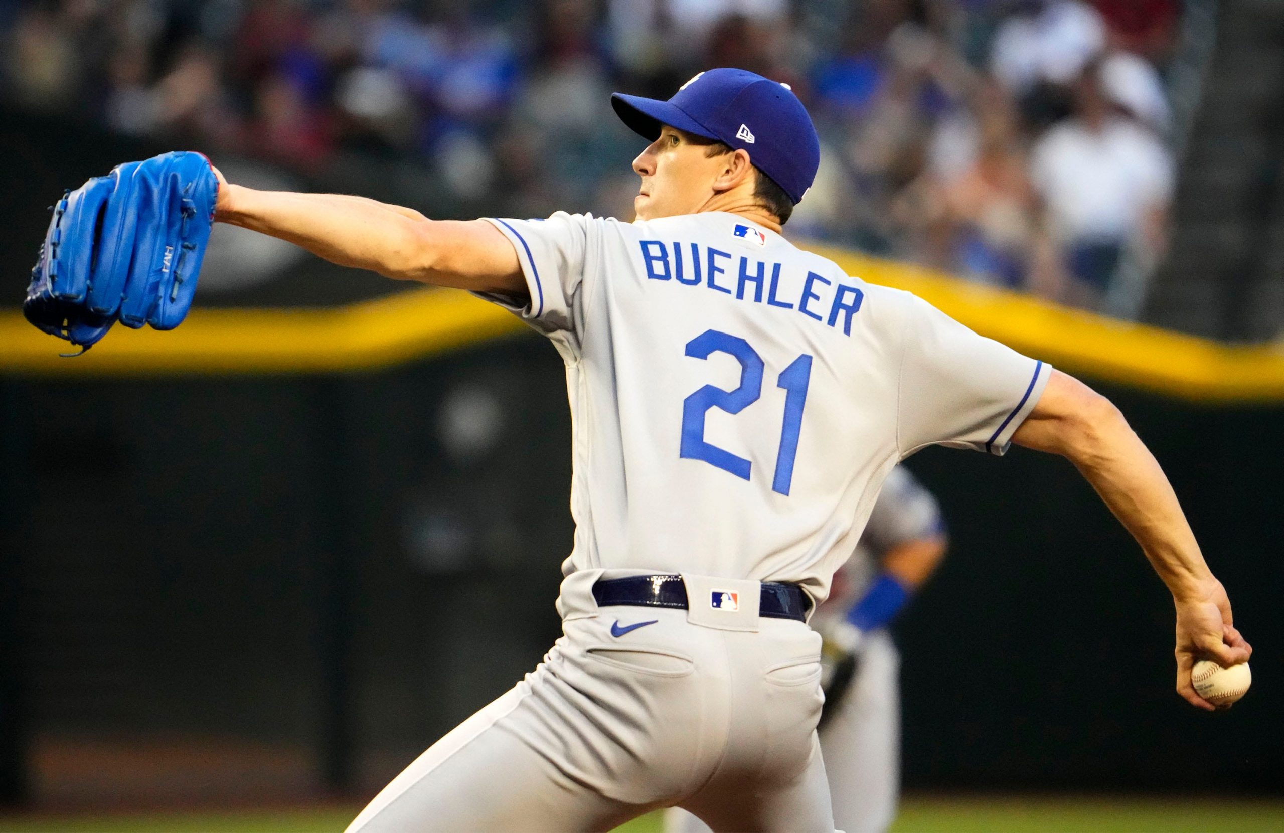 Los Angeles Dodgers starting pitcher Walker Buehler (21) throws to the Arizona Diamondbacks in the first inning at Chase Field
