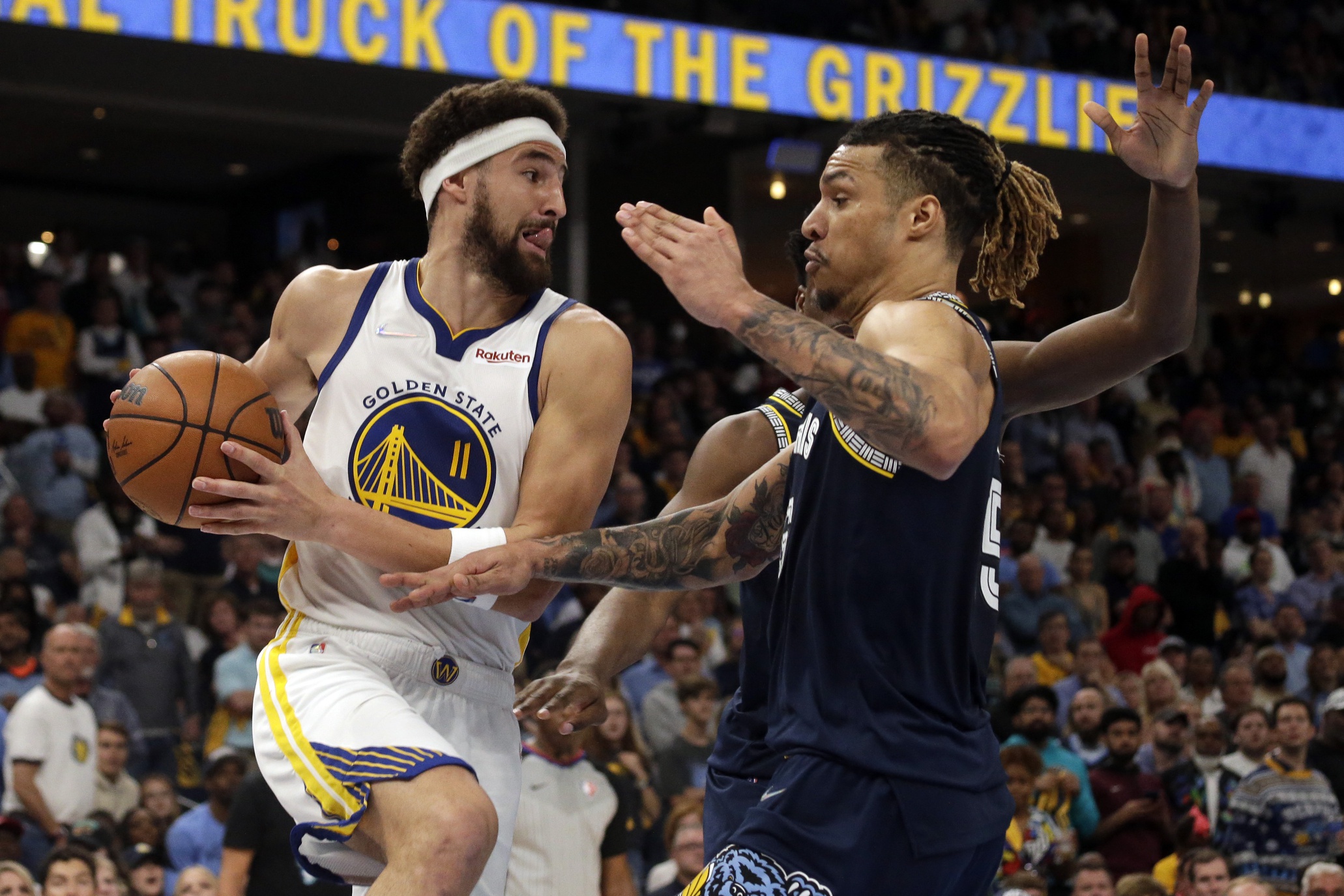 Golden State Warriors guard Klay Thompson (11) drives to the basket as Memphis Grizzlies forward Brandon Clarke (15) defends during the second half in game two of the second round for the 2022 NBA playoffs.