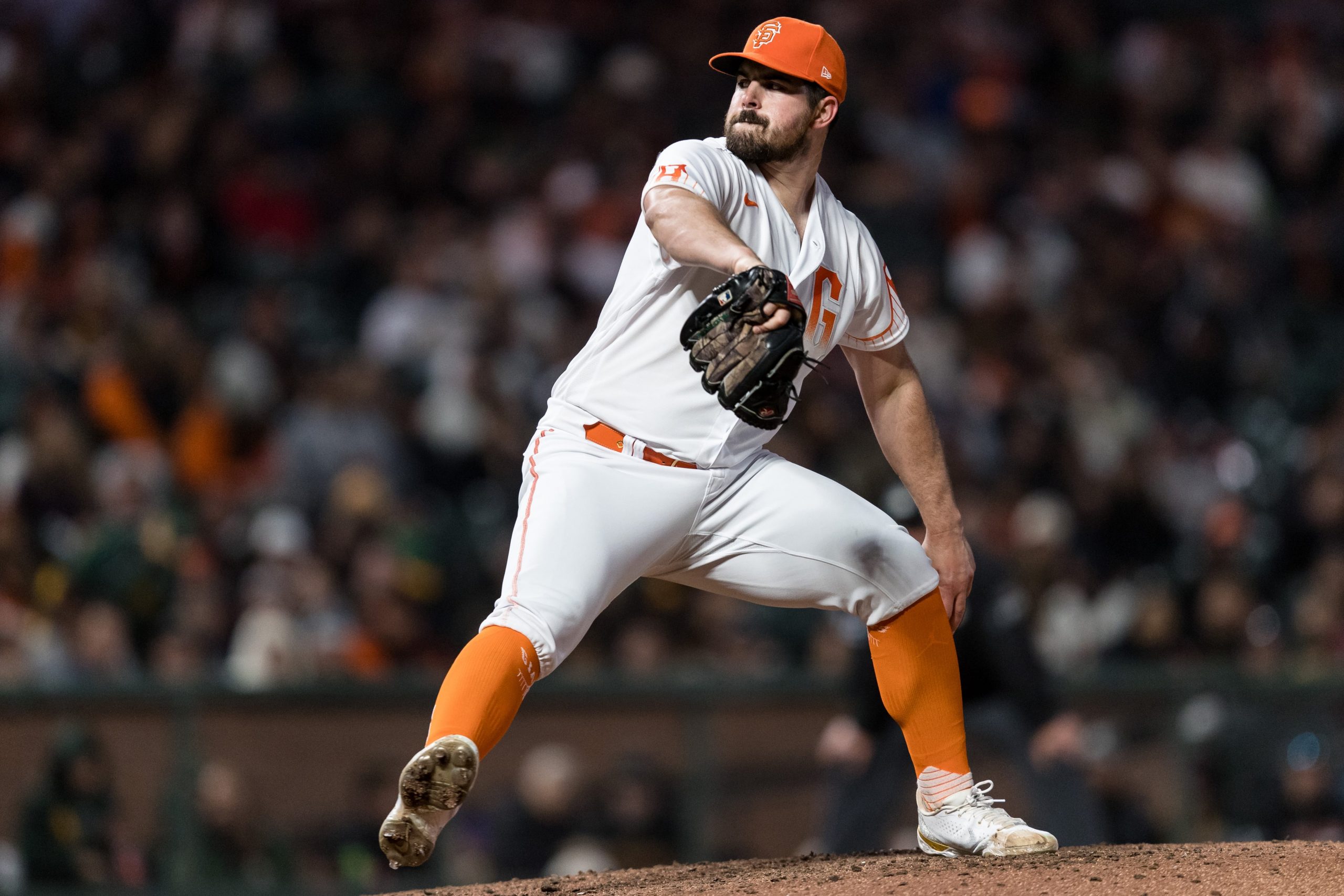 San Francisco Giants starting pitcher Carlos Rodon (16) throws against the Oakland Athletics during the fifth inning at Oracle Park.