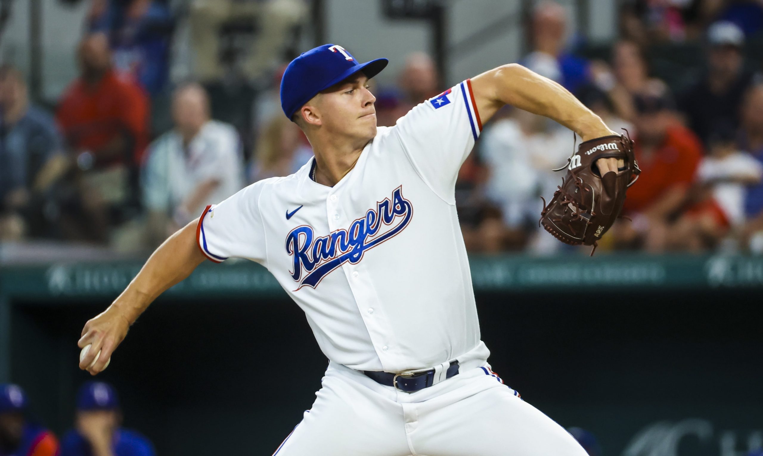 Texas Rangers starting pitcher Glenn Otto (49) throws during the first inning against the Boston Red Sox at Globe Life Field.