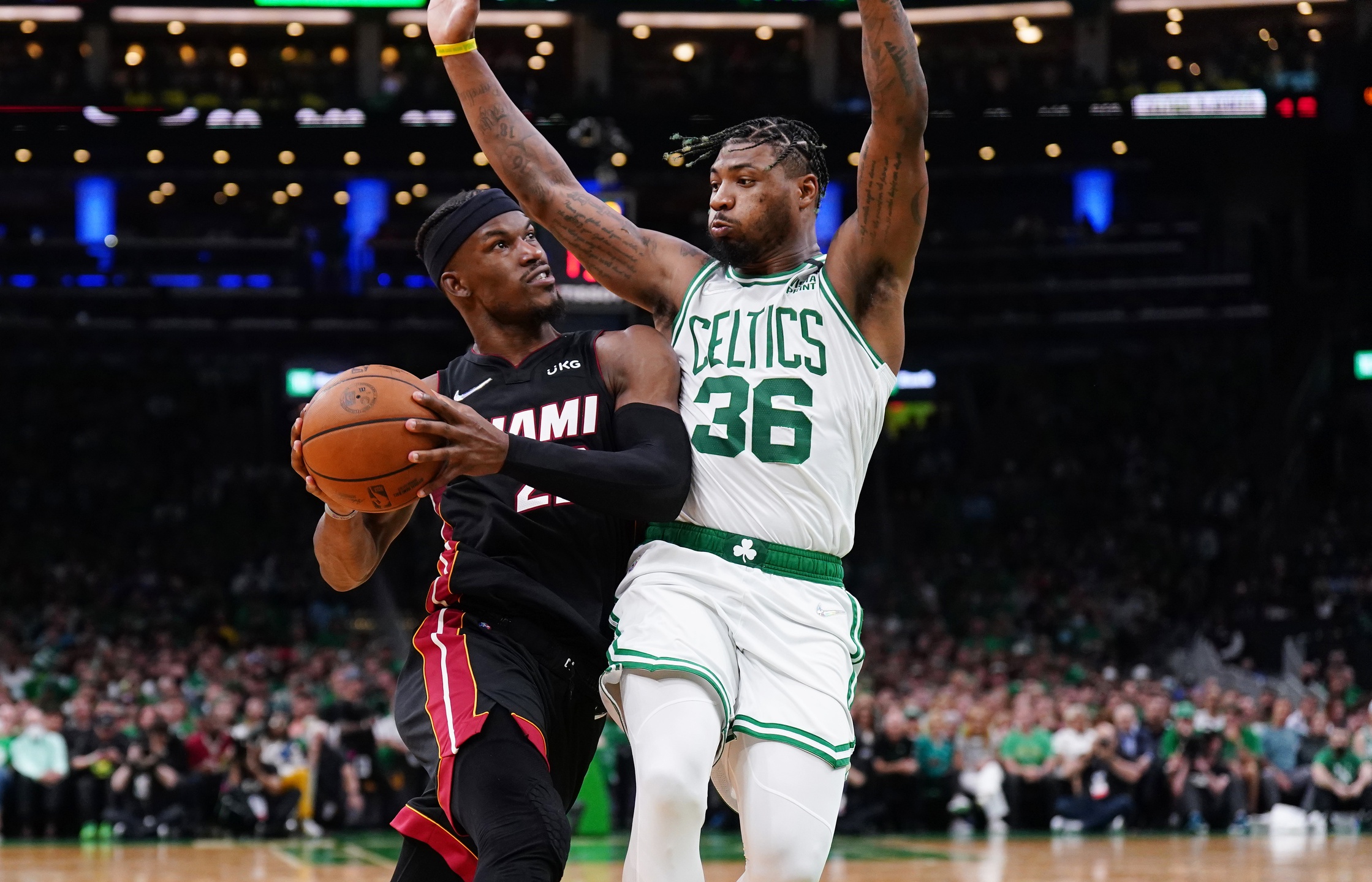 Miami Heat forward Jimmy Butler (22) drives to the basket against Boston Celtics guard Marcus Smart (36) in the second quarter during game three of the 2022 eastern conference finals at TD Garden.