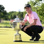 Justin Thomas poses with the Wanamaker trophy after winning the PGA Championship golf tournament at Southern Hills Country Club.