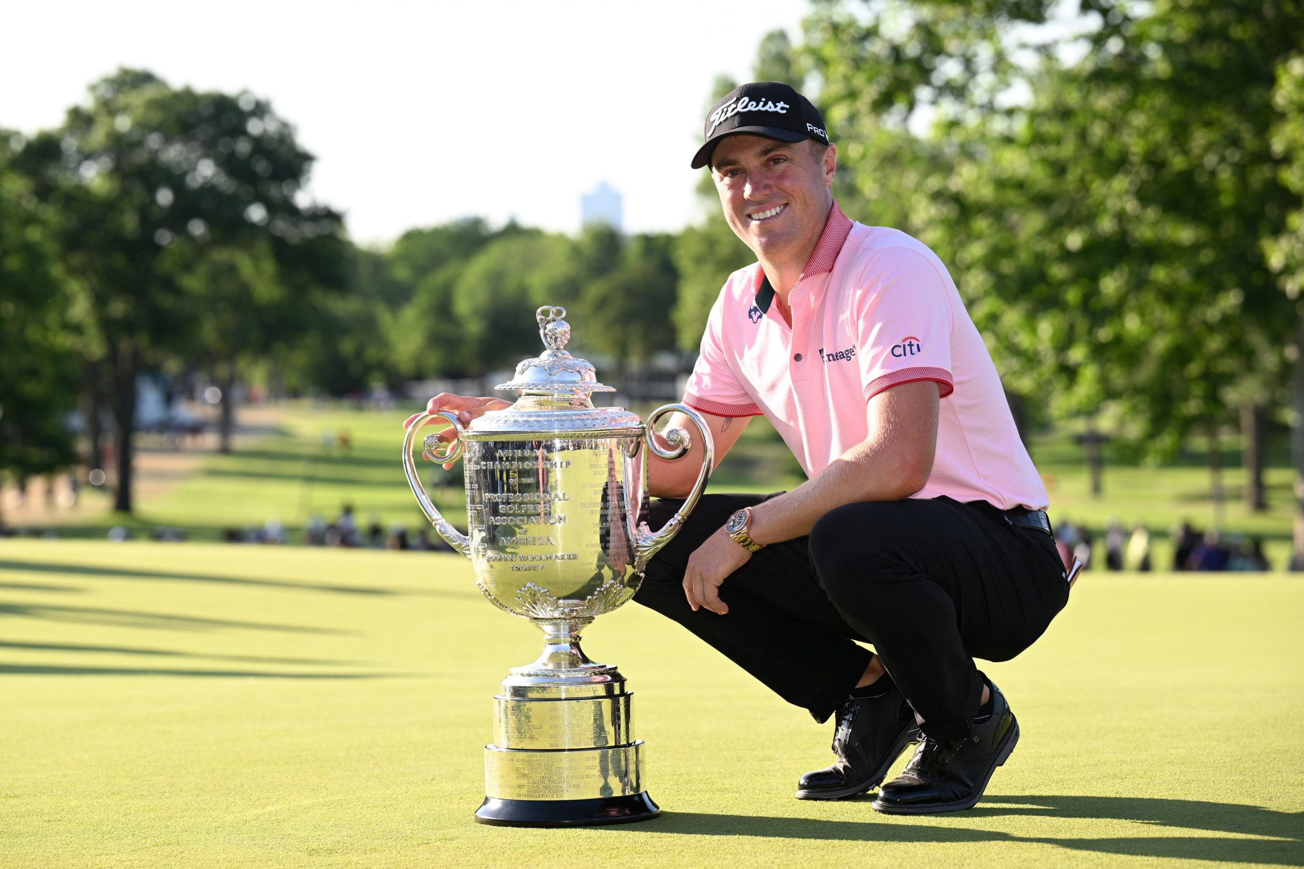 Justin Thomas poses with the Wanamaker trophy after winning the PGA Championship golf tournament at Southern Hills Country Club.