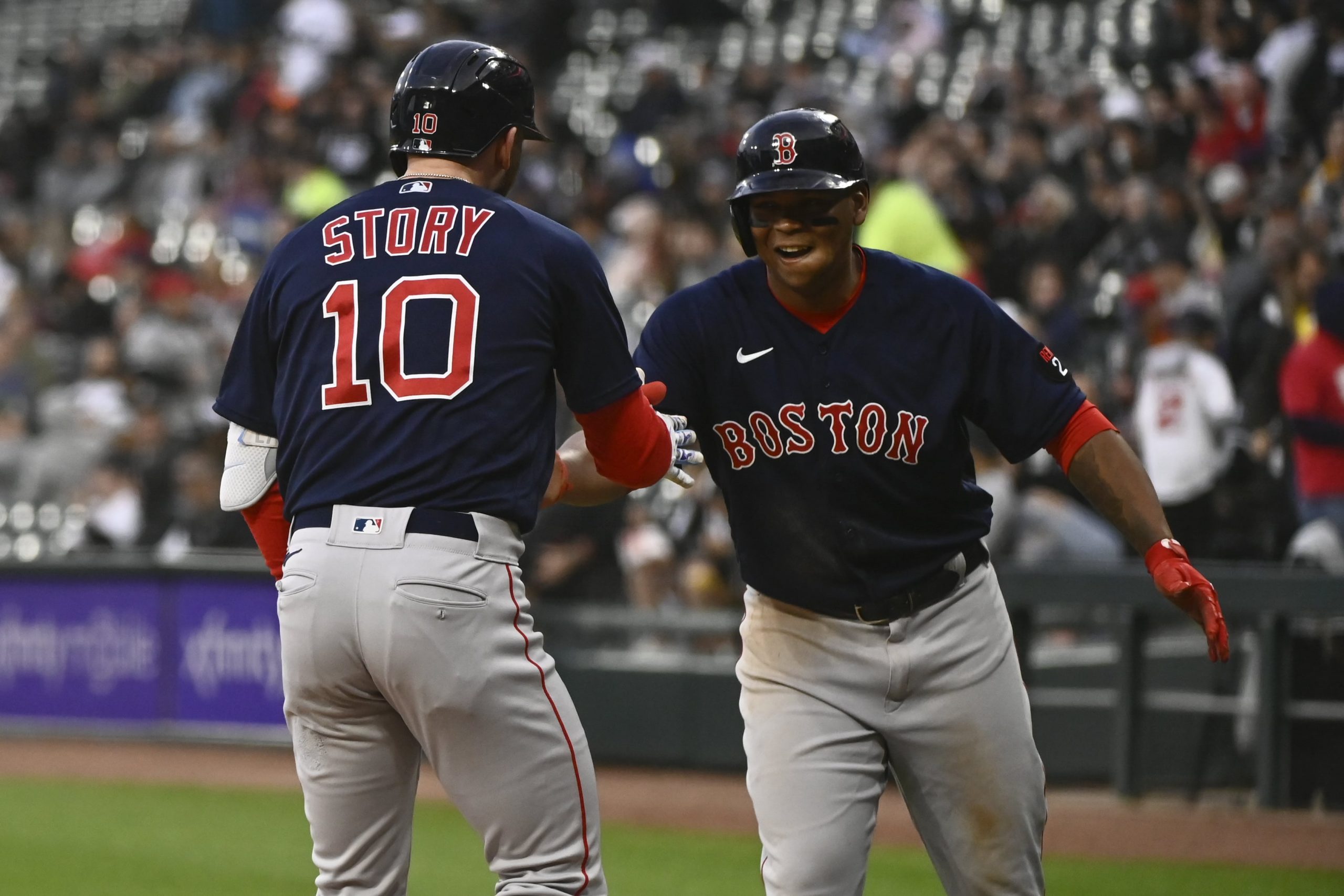 Red Sox hitters Trevor Story and Rafael Devers
