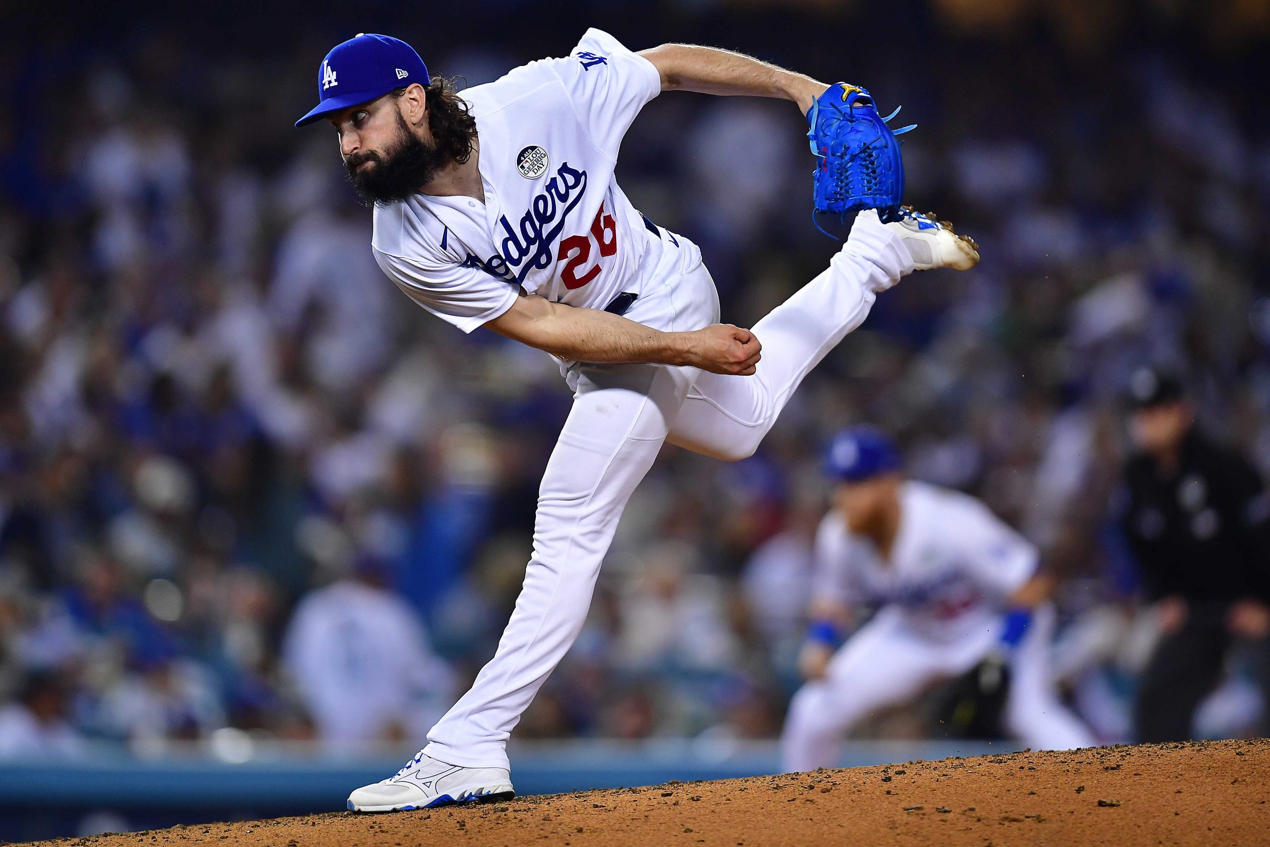 Los Angeles Dodgers starting pitcher Tony Gonsolin (26) throws against the New York Mets during the sixth inning at Dodger Stadium.