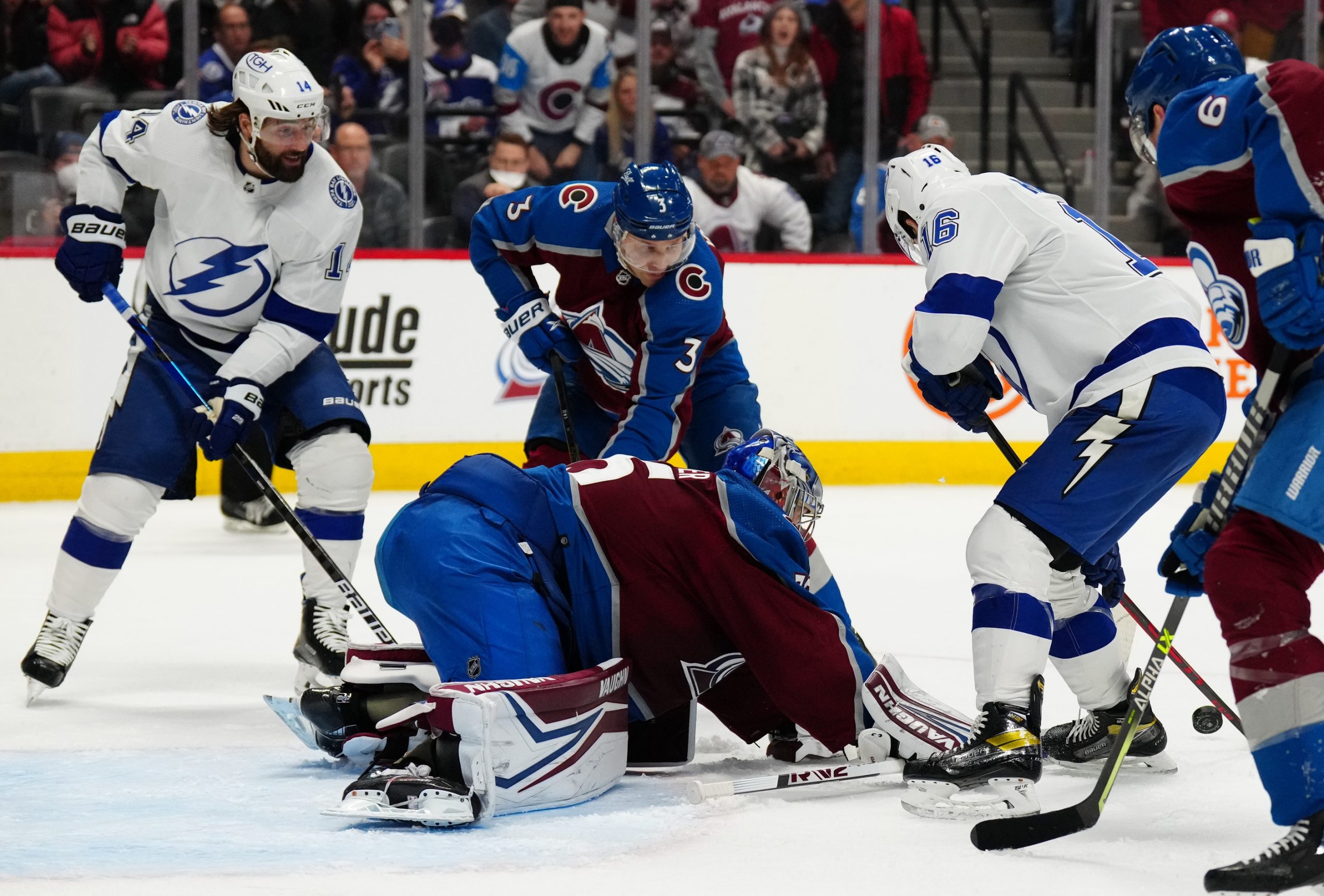 Tampa Bay Lightning right wing Taylor Raddysh (16) and left wing Pat Maroon (14) attempt to score past Colorado Avalanche goaltender Darcy Kuemper (35) and defenseman Jack Johnson (3) in the third per...