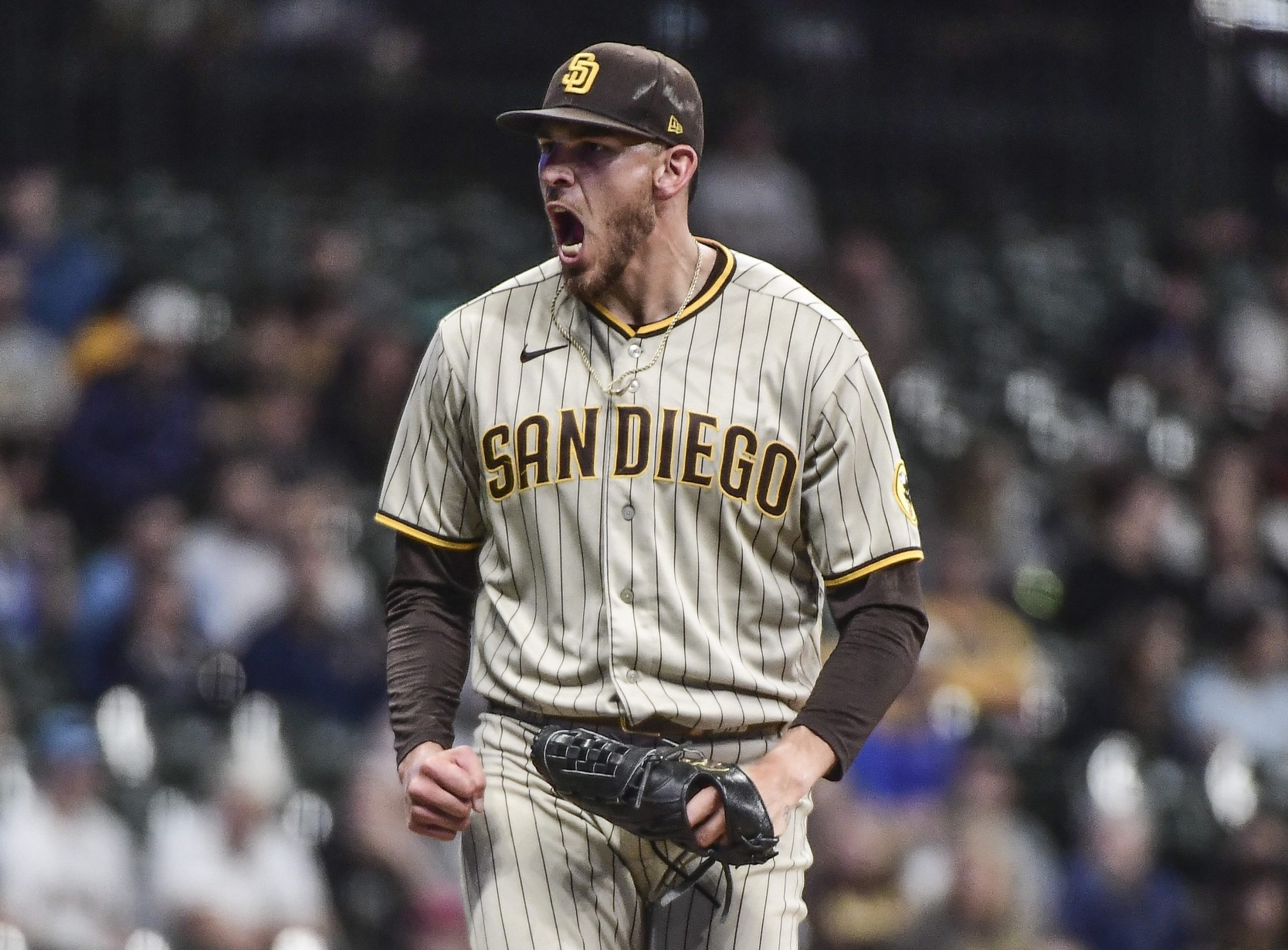 Jun 3, 2022; Milwaukee, Wisconsin, USA; San Diego Padres pitcher Joe Musgrove (44) reacts after striking out Milwaukee Brewers third baseman Jace Peterson (not pictured) in the seventh inning at American Family Field. Mandatory Credit: Benny Sieu-USA TODAY Sports