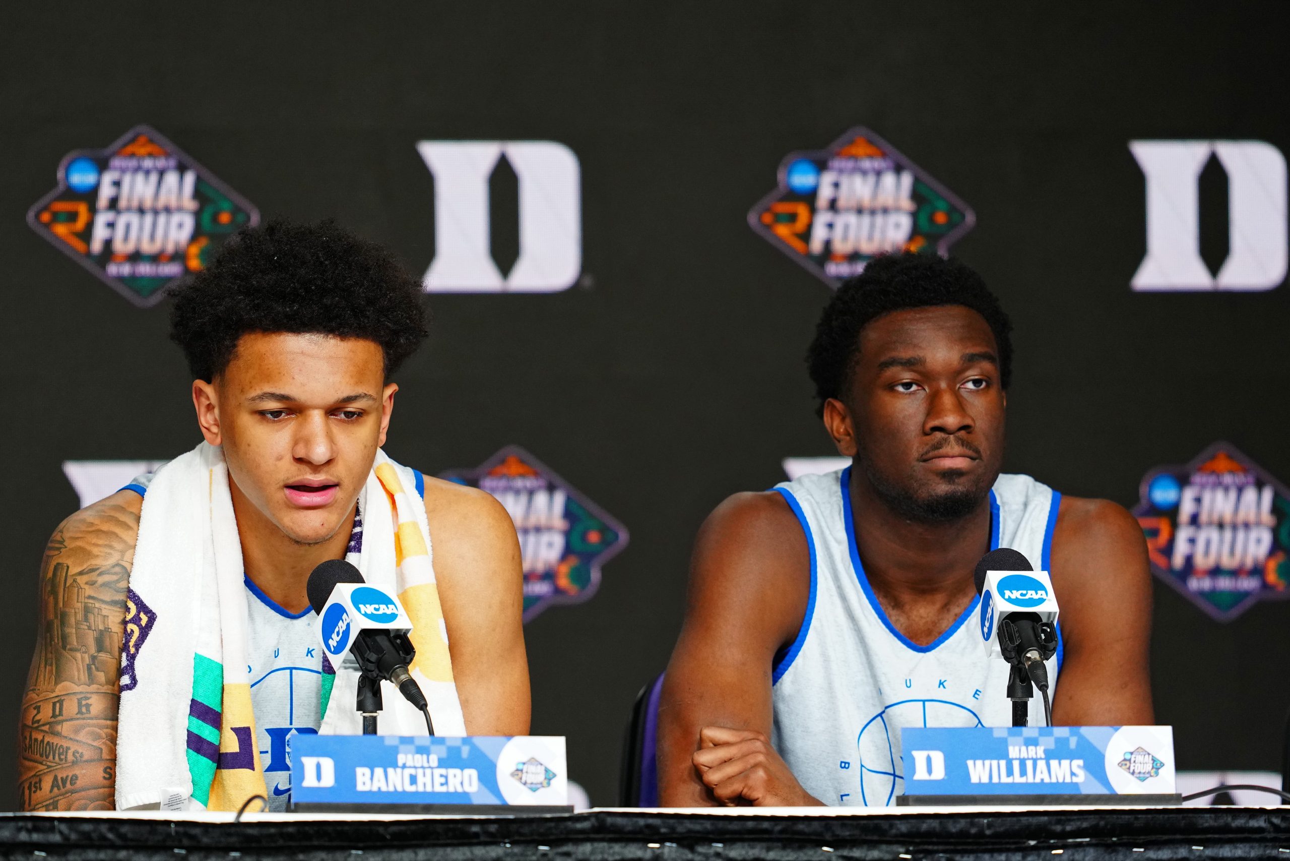 Paolo Banchero and Mark Williams of the Duke Blue Devils