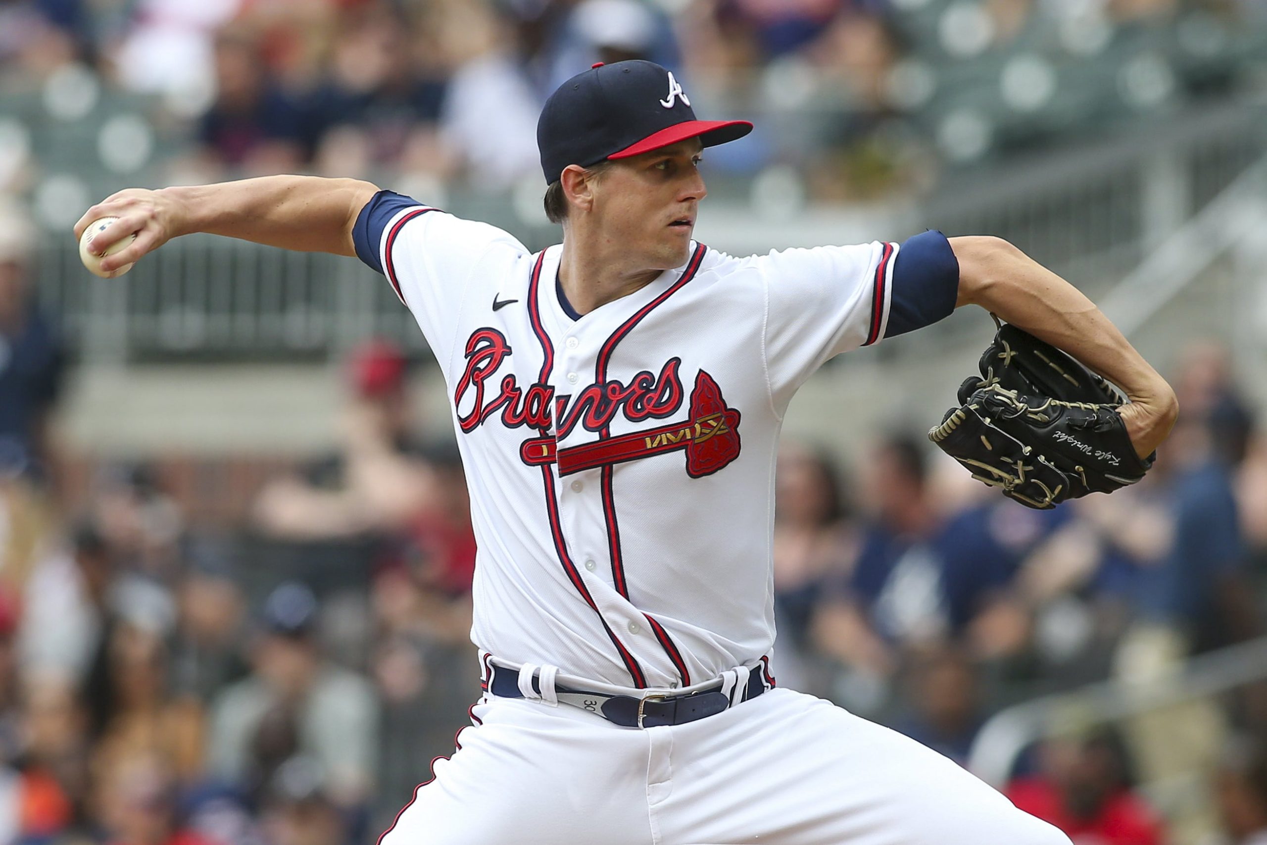 May 15, 2022; Atlanta, Georgia, USA; Atlanta Braves starting pitcher Kyle Wright (30) throws against the San Diego Padres in the first inning at Truist Park. Mandatory Credit: Brett Davis-USA TODAY Sports