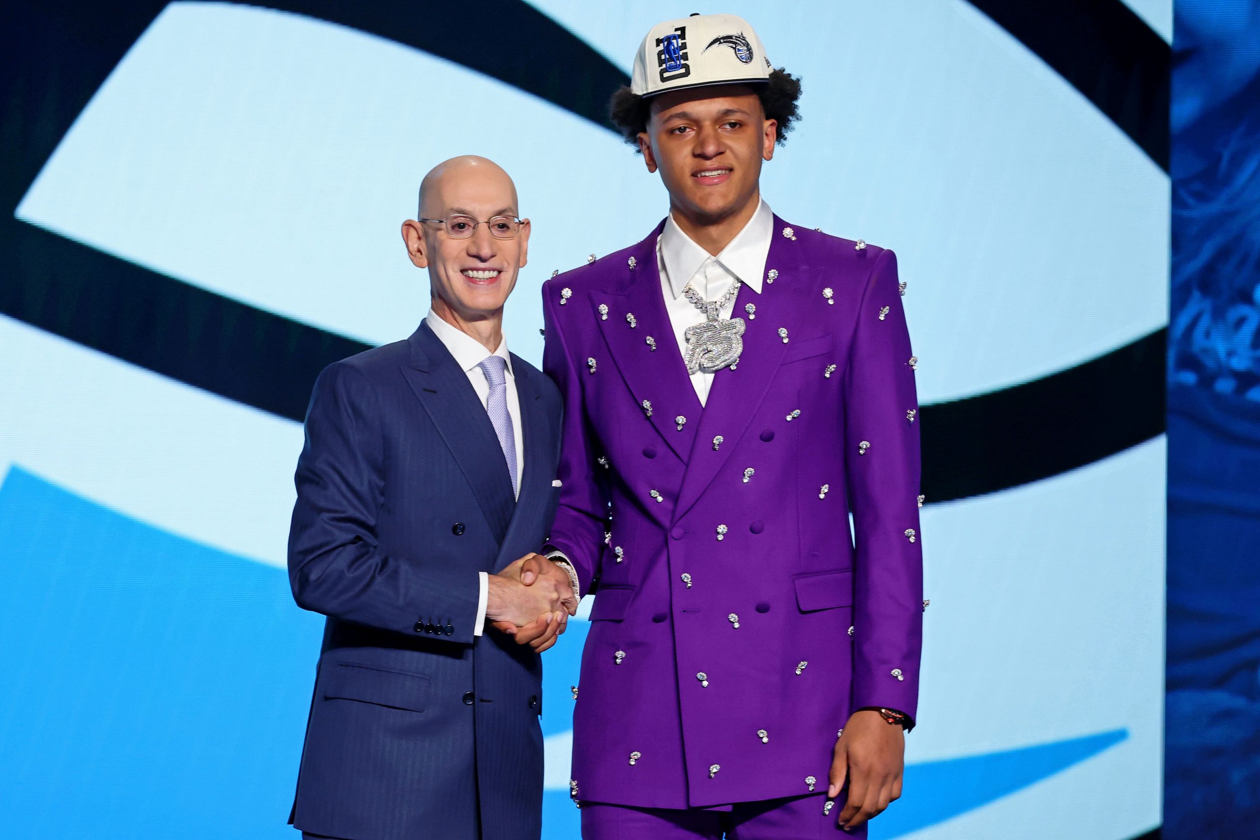 vPaolo Banchero (Duke) shakes hands with NBA commissioner Adam Silver after being selected as the number one overall pick by the Orlando Magic in the first round of the 2022 NBA Draft at Barclays Center.