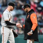 Apr 16, 2022; Cleveland, Ohio, USA; San Francisco Giants starting pitcher Anthony DeSclafani (26) is relived by manager Gabe Kapler (19) during the fifth inning against the Cleveland Guardians at Progressive Field. Mandatory Credit: Ken Blaze-USA TODAY Sports