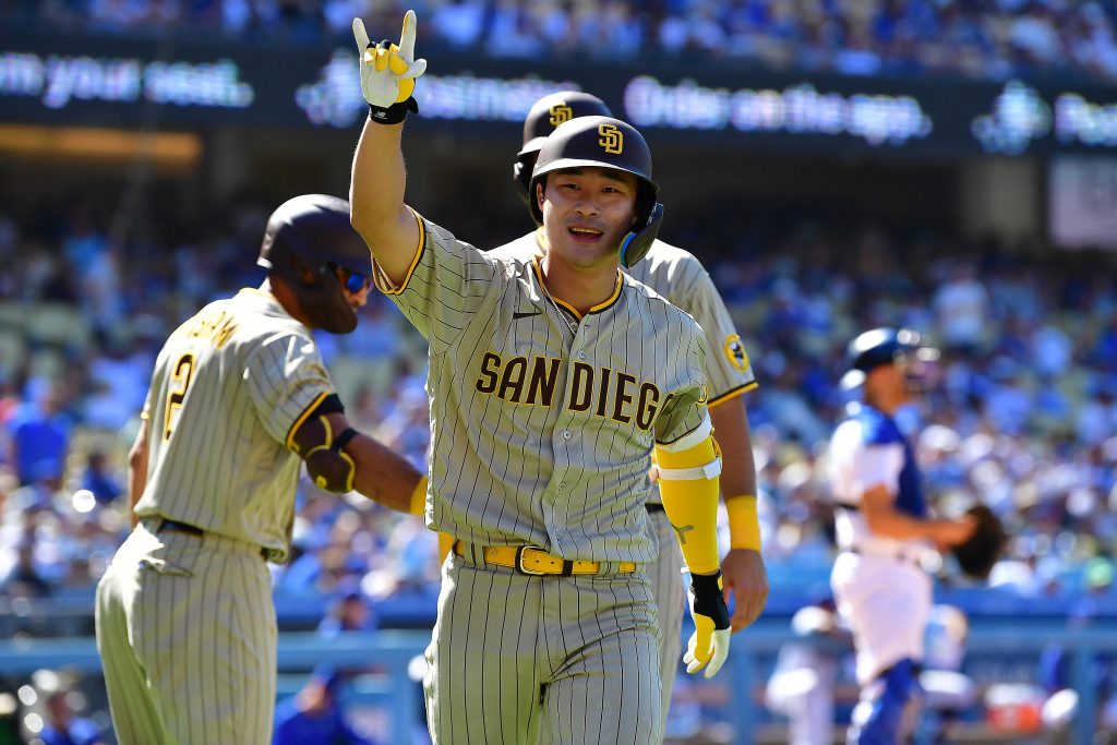 San Diego Padres shortstop Ha-Seong Kim (7) reacts after hitting a two run home run against the Los Angeles Dodgers during the ninth inning at Dodger Stadium.