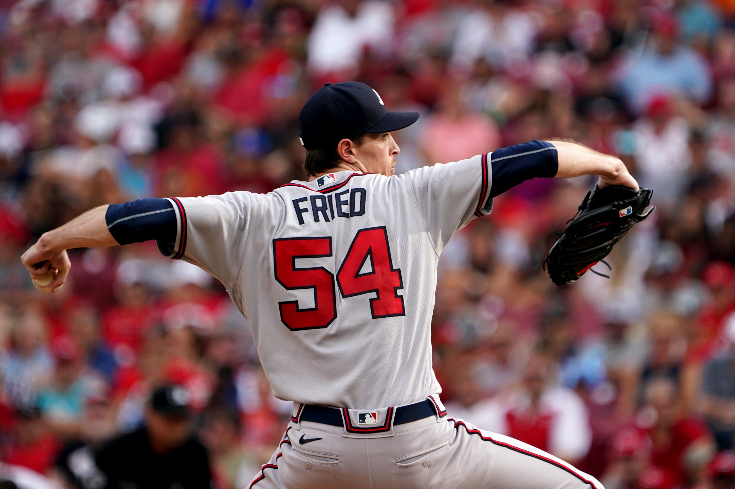 Atlanta Braves starting pitcher Max Fried (54) delivers during the first inning of a baseball game against the Cincinnati Reds, Friday, July 1, 2022, at Great American Ball Park in Cincinnati.
