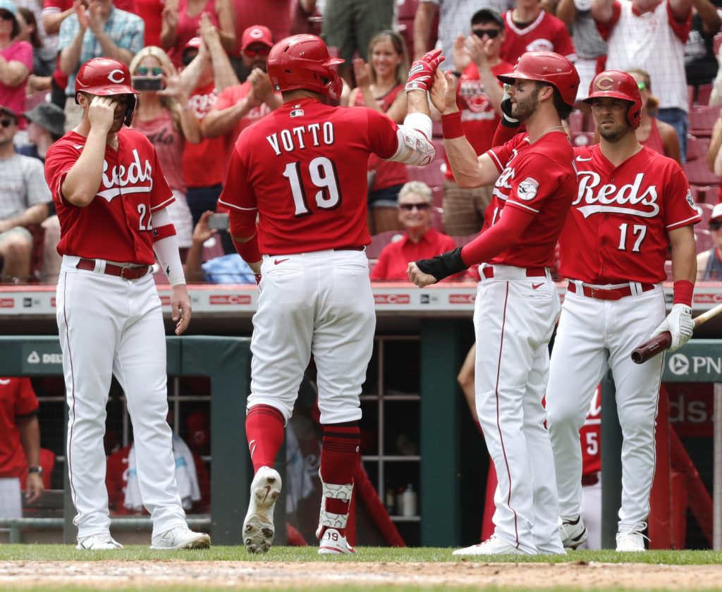 Cincinnati Reds designated hitter Joey Votto (19) reacts at home after hitting a three-run home run against the St. Louis Cardinals during the third inning at Great American Ball Park.
