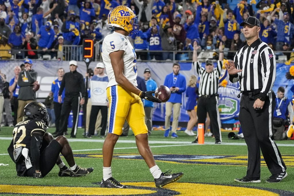 Dec 4, 2021; Charlotte, NC, USA; Pittsburgh Panthers wide receiver Jared Wayne (5) celebrates after scoring against the Wake Forest Demon Deacons during the second quarter in the ACC championship game at Bank of America Stadium.