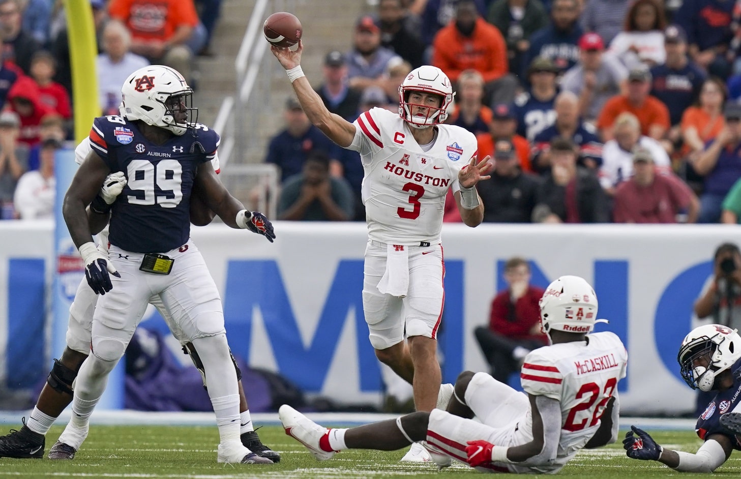 Dec 28, 2021; Birmingham, Alabama, USA; Houston Cougars quarterback Clayton Tune (3) passes against the Auburn Tigers during the second half of the 2021 Birmingham Bowl at Protective Stadium.